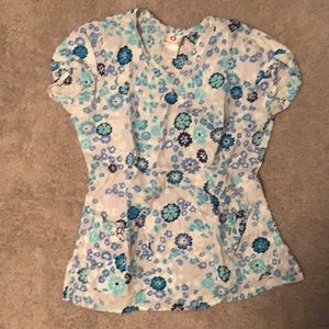 XS white cross blue floral scrub top